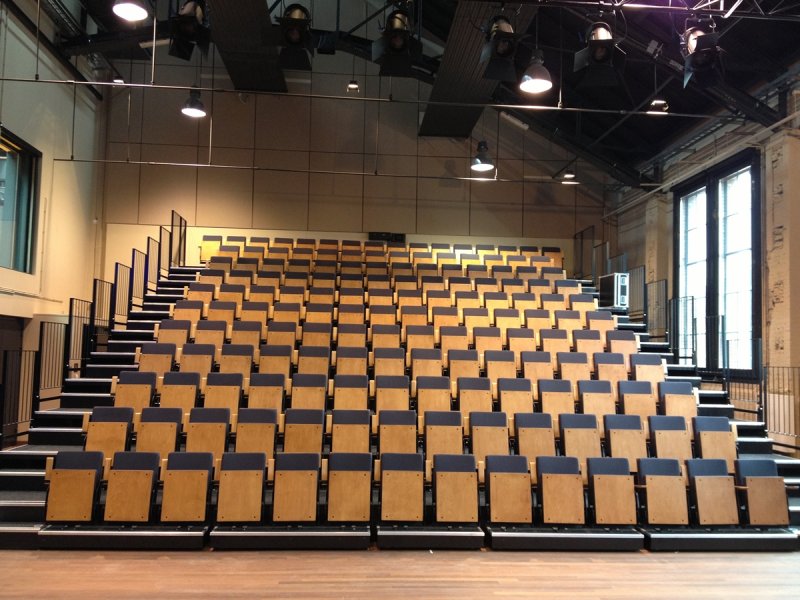 Fully automatically operated retractable grandstand. Hall: Ketel 1, Energiehuis Dordrecht.