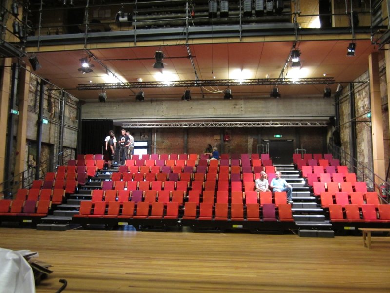 Modular and mobile retractable grandstands, custom engineered. For the multifunctional use in Grand Theatre Groningen. 