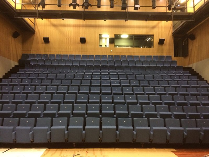 Retractable grandstand in Blue hall of Theater De Bussel Oosterhout, The Netherlands